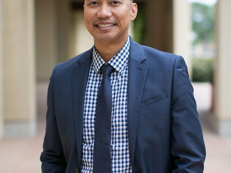 young-diverse-millennial-man-wearing-a-business-su-5GA8NF3.jpg